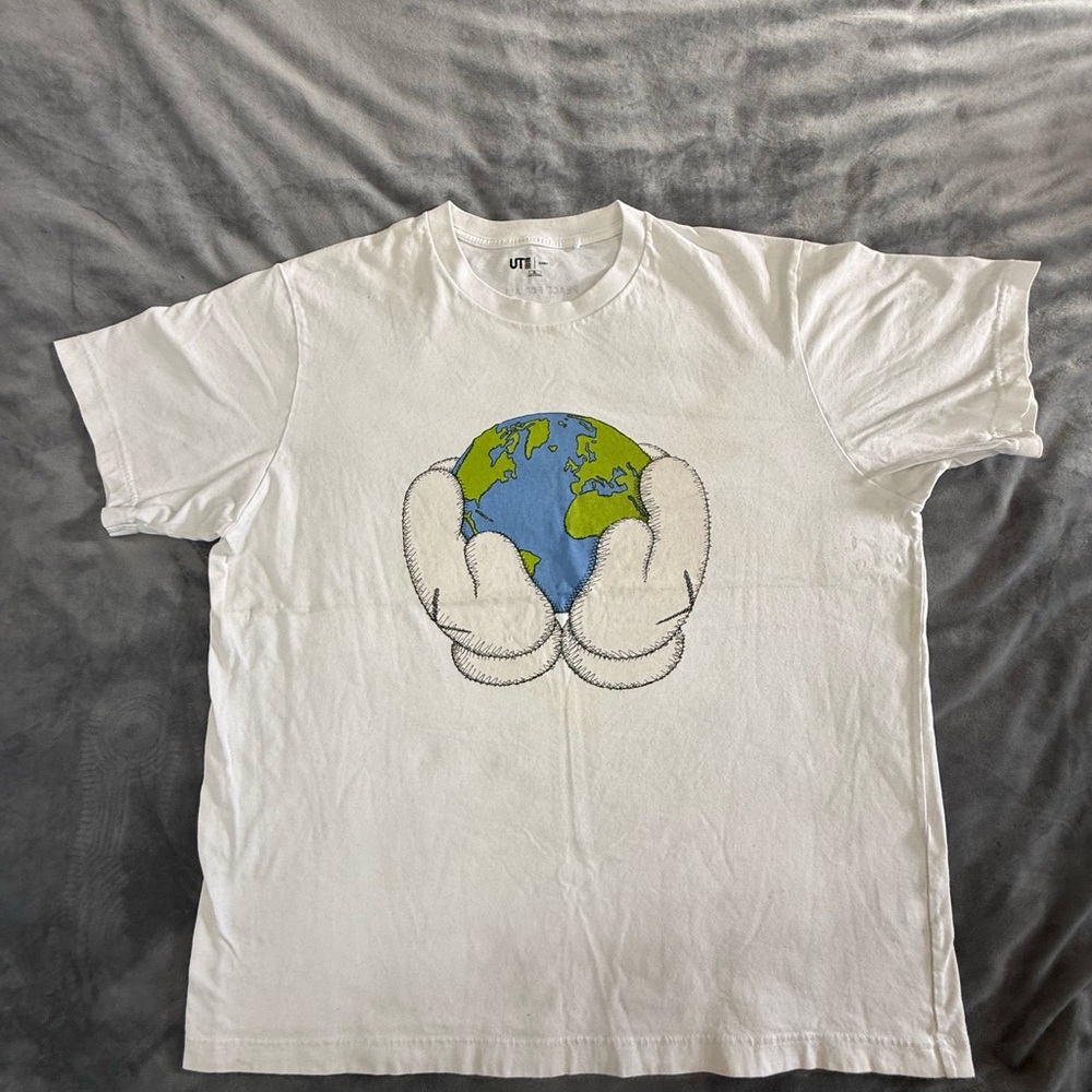 Her Universe White Tee with Earth Held by Cartoon Gloves